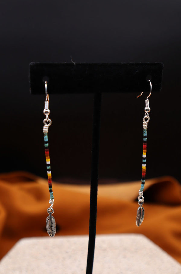 Dangle Earrings by Bobby R. Blue